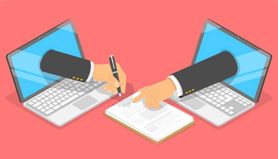 Manos salen de dos pantallas de computadoras portátiles en una imagen que ilustra las firmas electrónicas