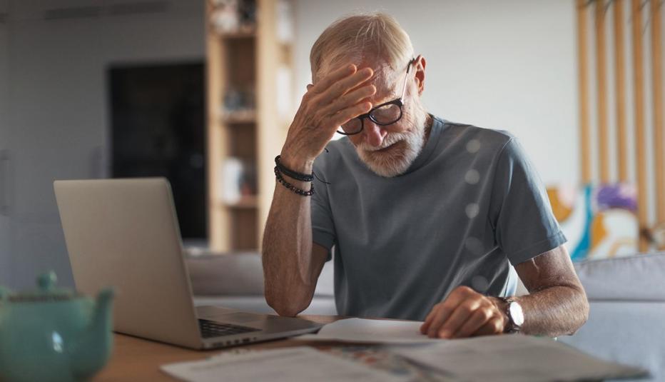 Older man reviewing finances