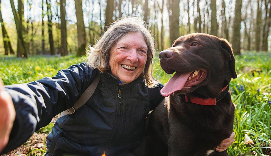 Older Woman Taking a Selfie With Her Dog