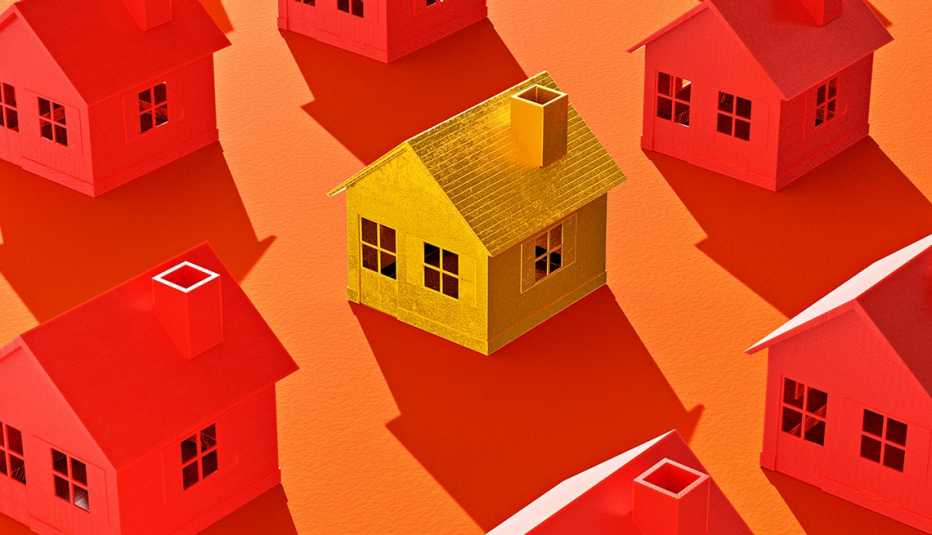 grupo de casas todas de rojo pero una es amarilla