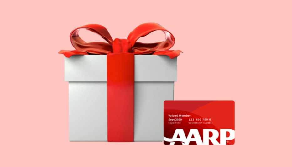 white gift box and red ribbon with an aarp card to depict gifting a membership 