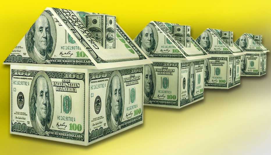 Gráfica de casas hechas con billetes