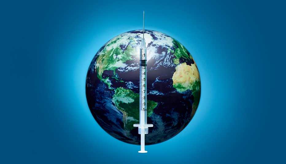 Una inyección sobre superpuesta sobre una imagen de la tierra Una inyección sobre superpuesta sobre una imagen de la tierra