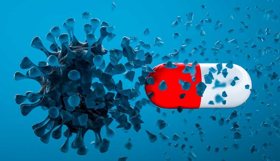 Ilustración de una pastilla destrullendo al coronavirus