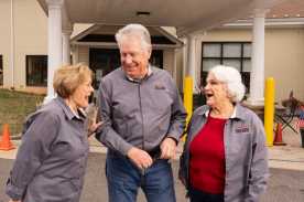 Tax-Aide Culpeper Sister Volunteers Sisters Charlotte (left) and Carolyn flank Carolyn’s husband, Jeff – outside the senior center where all three volunteer for Tax-Aide.