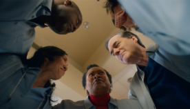 Joy of Volunteering A group of determined middle aged people in a huddle
