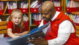 Chesney Butler tutors student, Samantha at Jeffersonville Elementary School