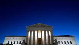 The U.S. Supreme Court against a blue sky in Washington, D.C., US.