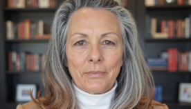 Woman in brown jacket
