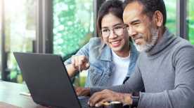 AARP Money Map™ a man and woman at home looking at a laptop together