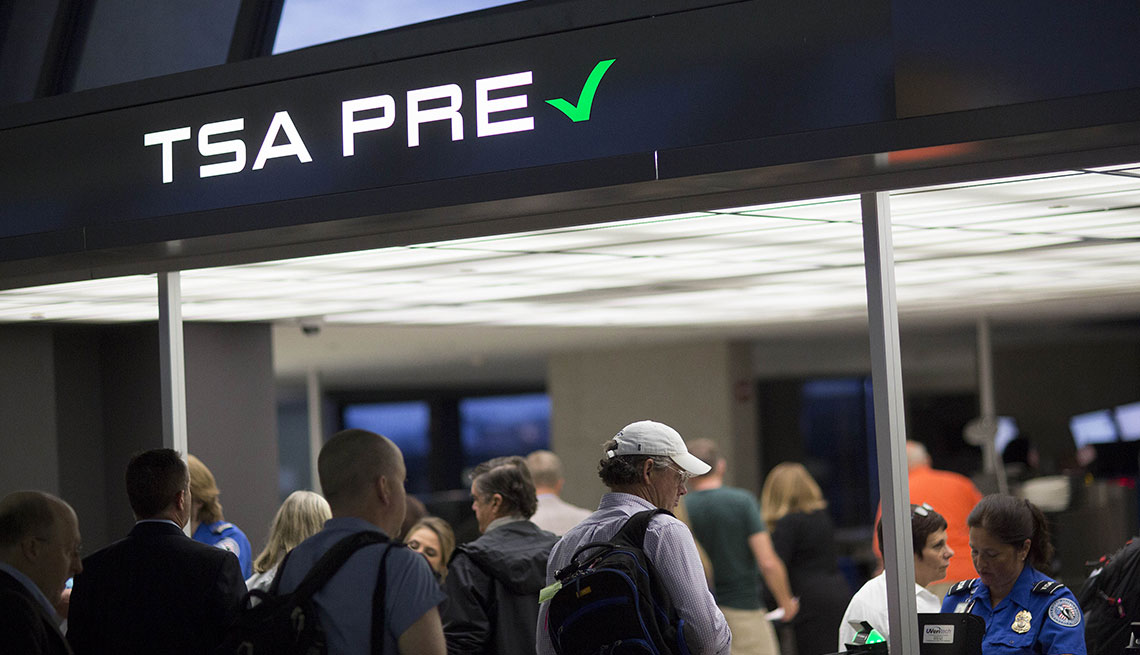 TSA Passengers stand in the Transportation Security Administration (TSA) pre-check line at an airport