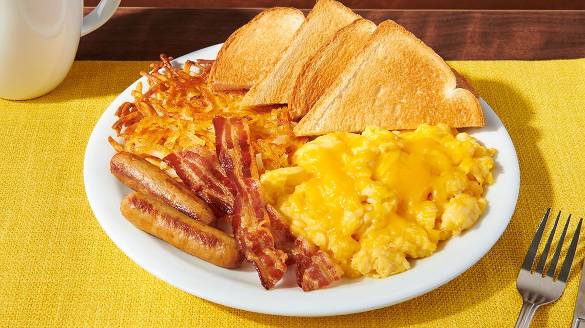 scrambled eggs, cheddar cheese, bacon strips, sausage links, hash browns, 4 pieces of white bread toast