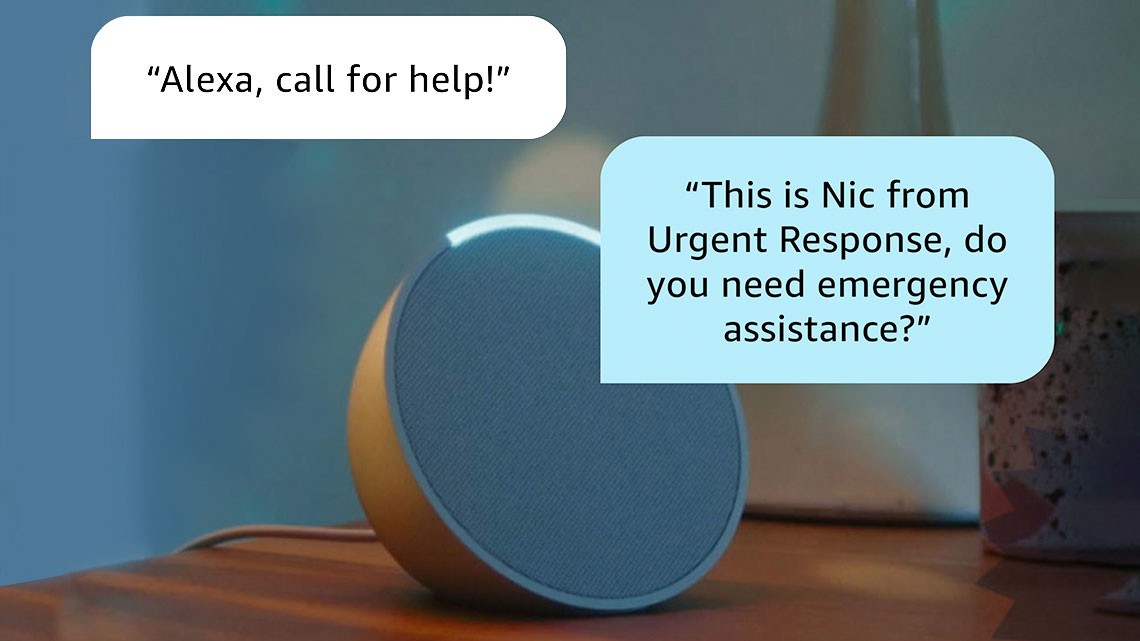 device sitting on a table in the living space with two comment bubbles. one says Alexa, call for help and the other one says this is Nic from Urgent Response, do you need emergency assistance?