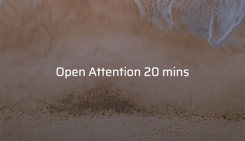Ocean tide on a sandy beach with the text "Open Attention 20 mins"