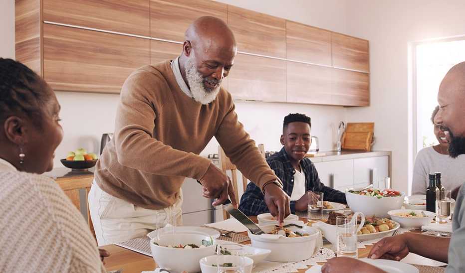 A family eating a meal together in a home