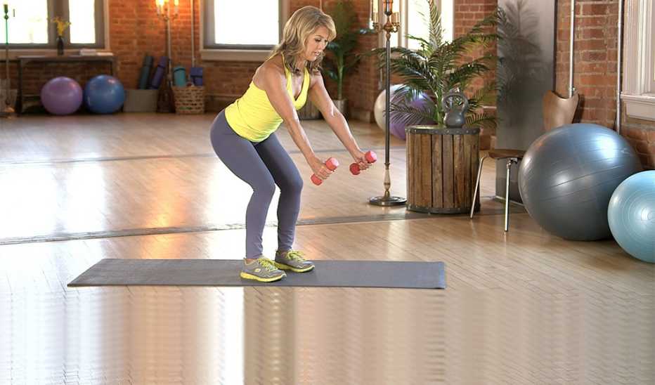 Denise Austin demonstrating a double arm row exercise