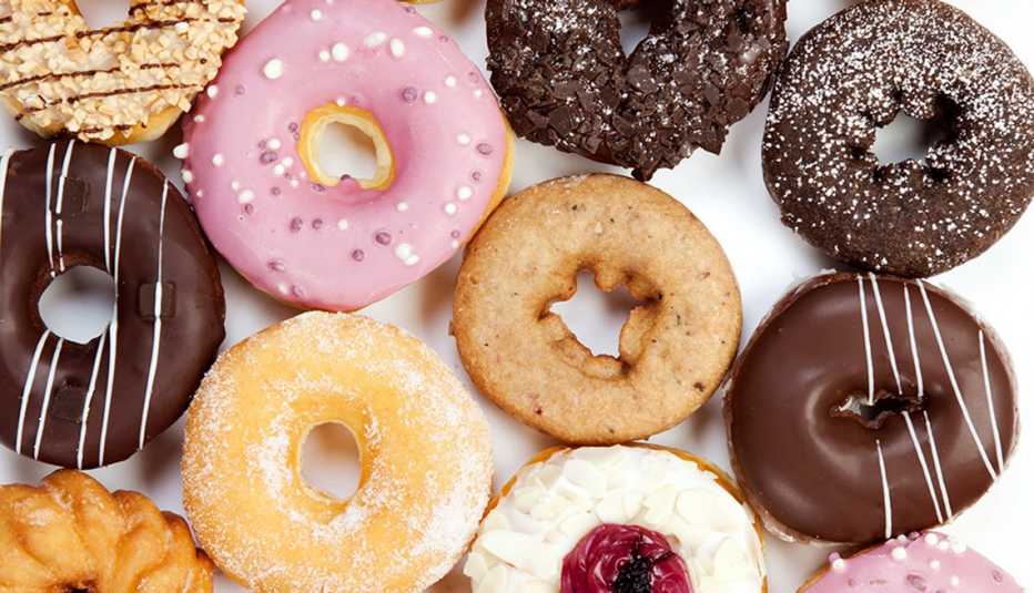 A close-up view of several different kinds of doughnuts