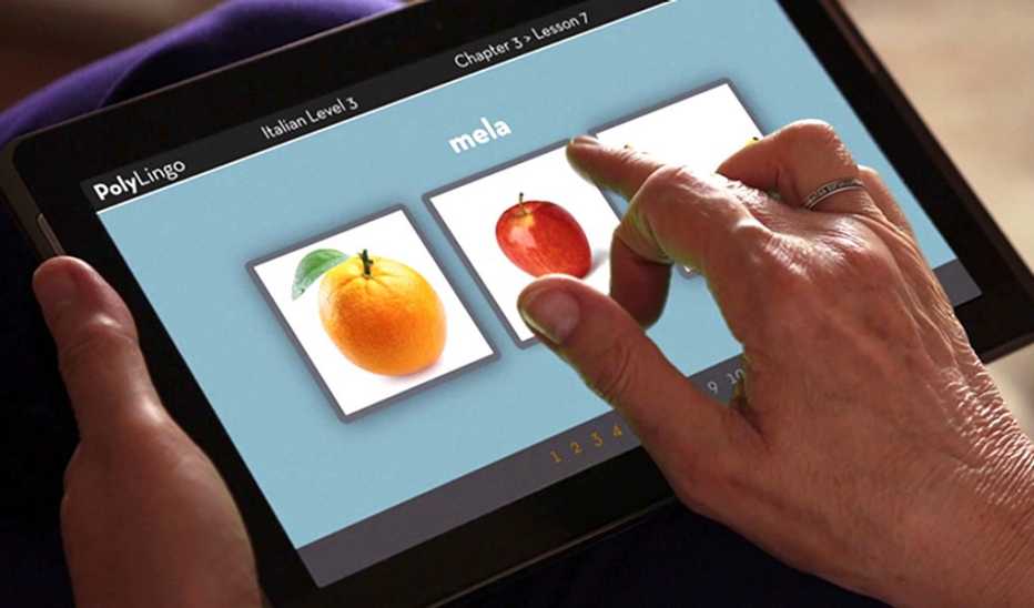 A close-up view of a hand using a tablet