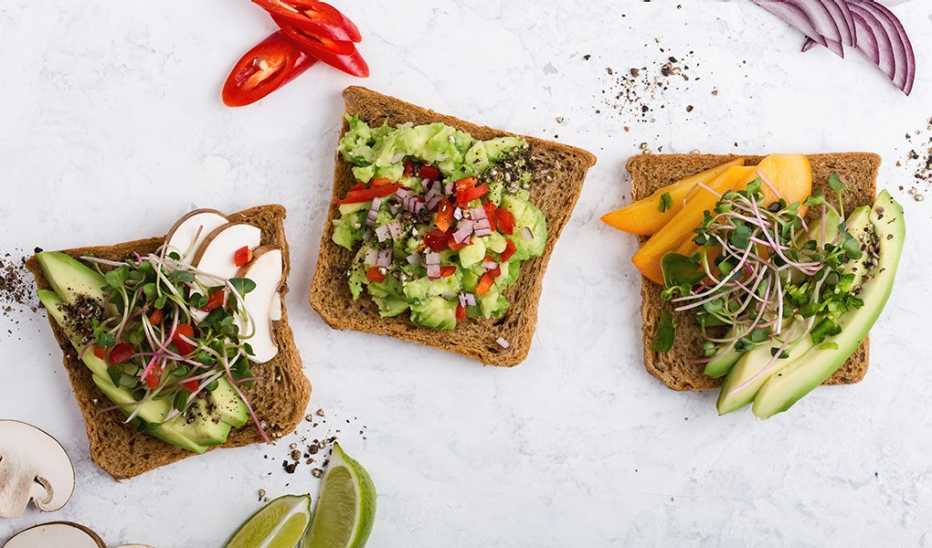 An overhead view of avocado toasts