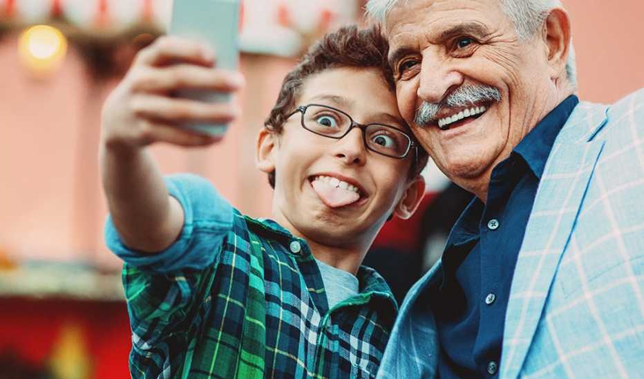 A man and boy taking a selfie