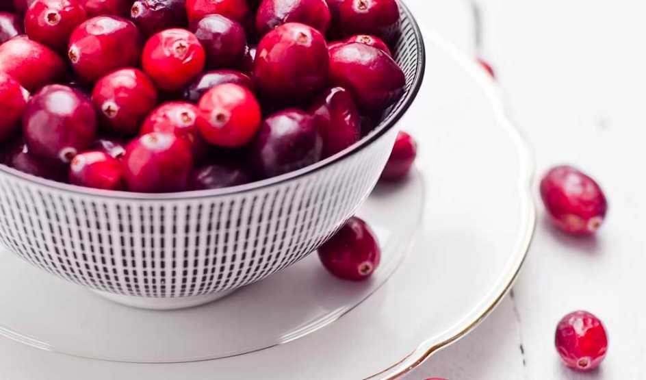 An up-close view of a bowl of cranberries