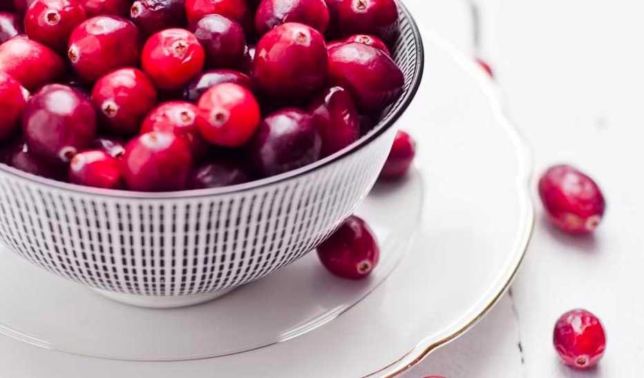 An up-close view of a bowl of cranberries