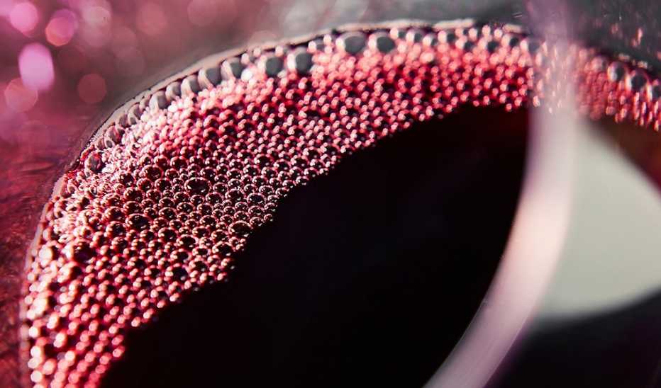 A close-up view of red wine in a glass
