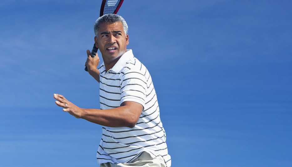 A man playing tennis