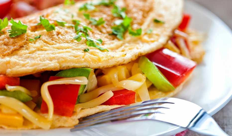 A close-up view of an omelette on a plate