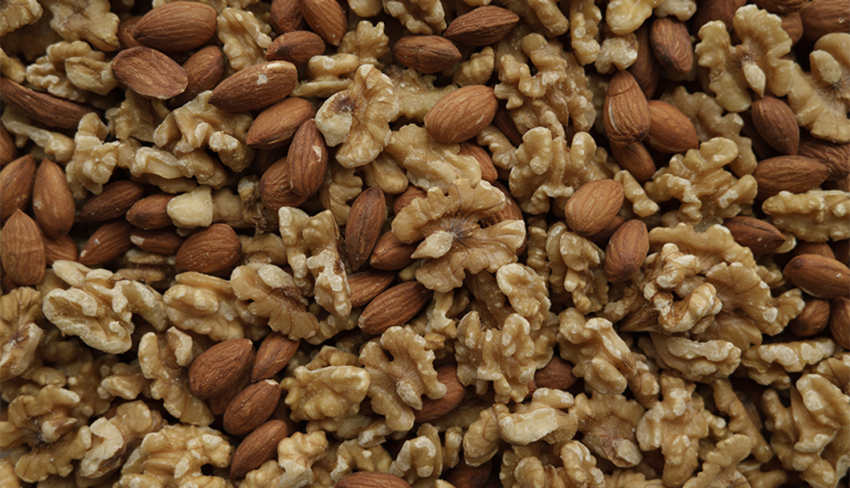 An overhead view of almonds and walnuts
