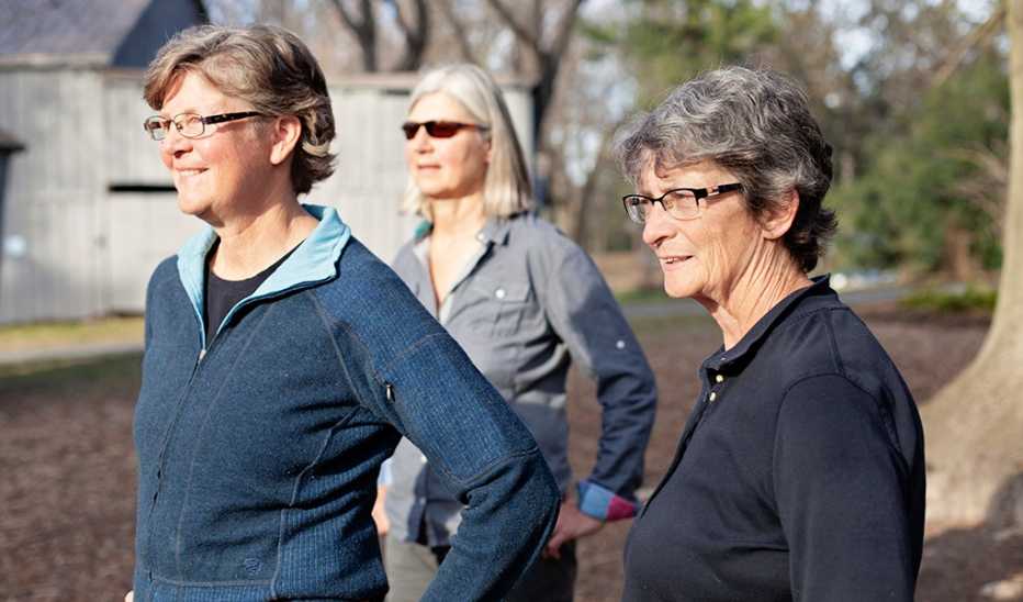 Three women looking out at something