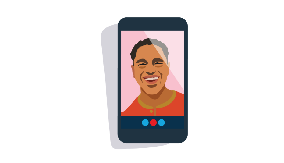 A smiling man during a mobile phone chat