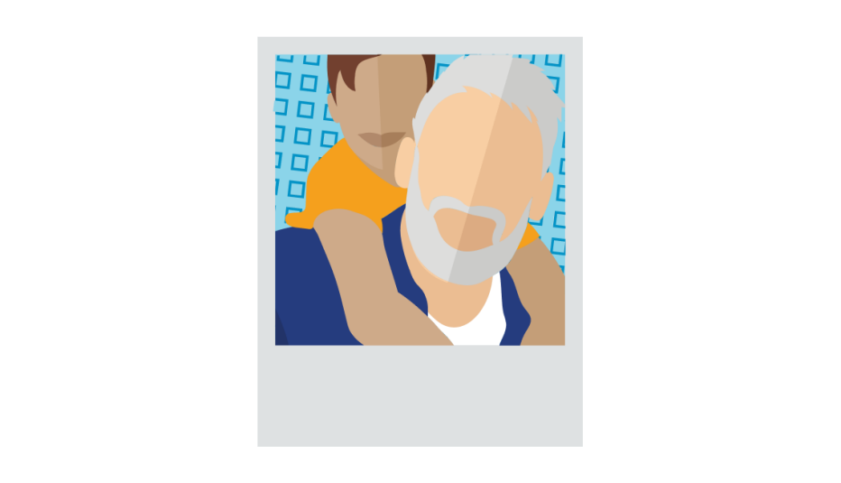 A photo of an older man giving a young boy a piggyback ride