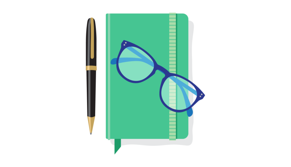 A green notebook with blue glasses on top and a brown pen beside it