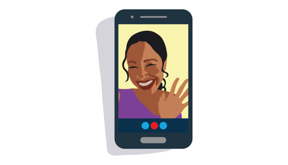 Smiling woman waving her hand during a mobile phone chat