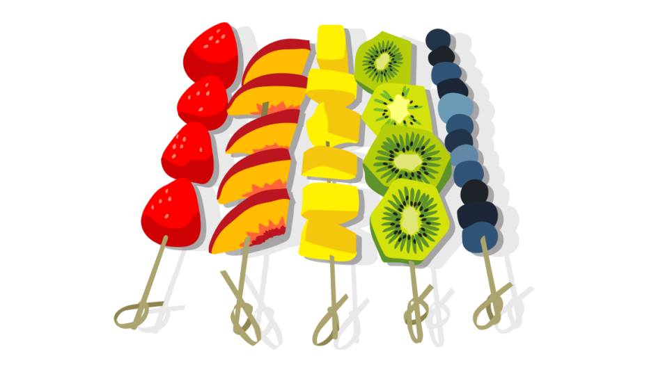 Fruit kabobs of strawberries, peaches, pineapples, kiwis and blueberries on skewers