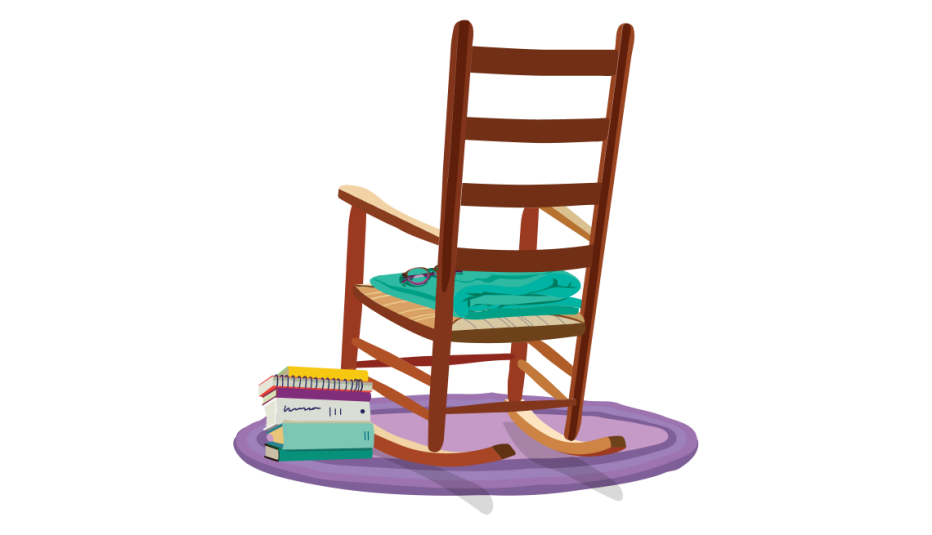 A rocking chair with a green blanket and a stack of books