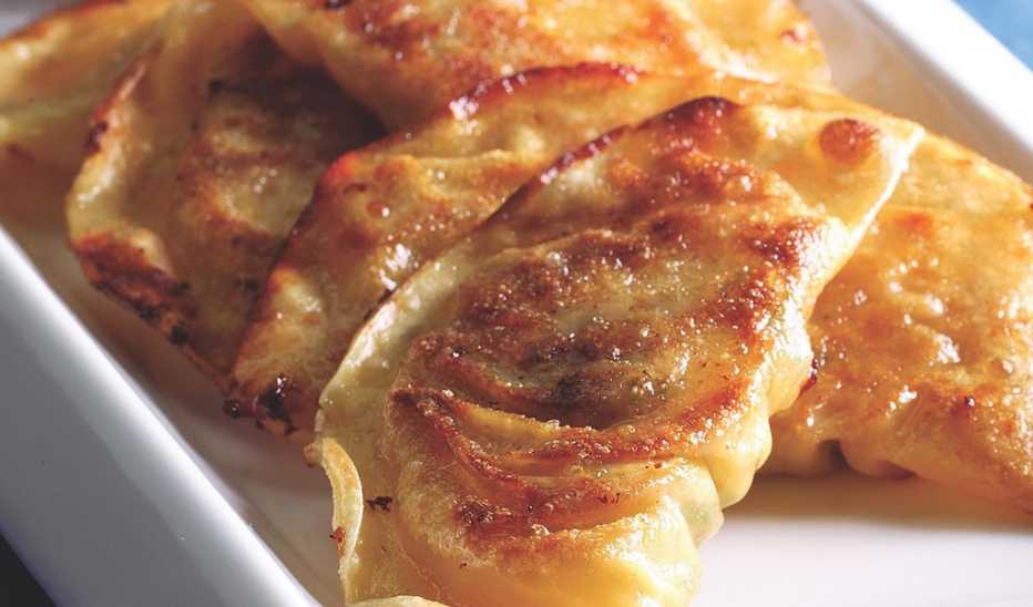 A close-up view of ginger-garlic dipping sauce