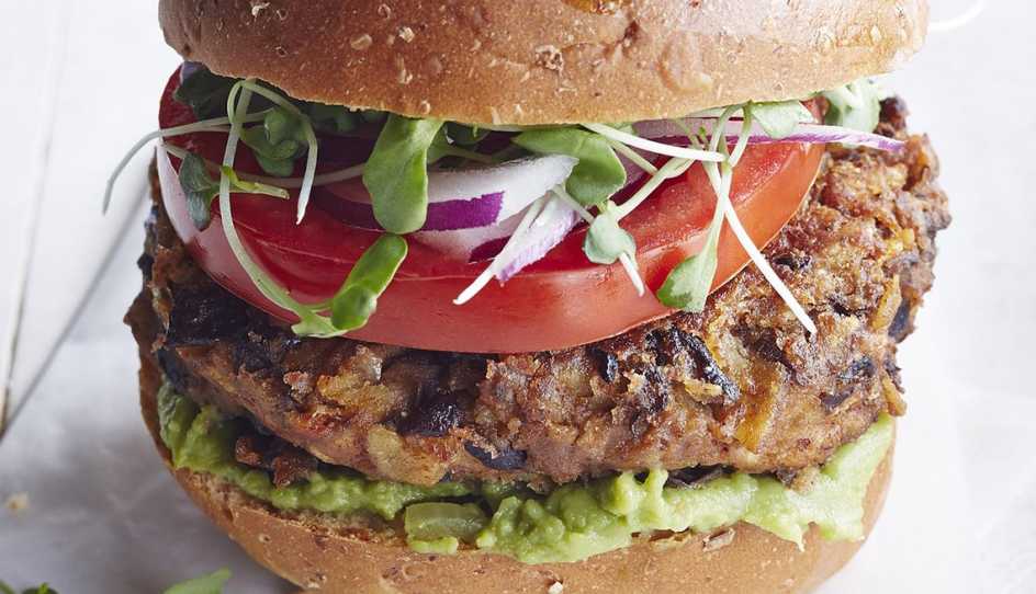A close-up view of a salsa-black bean burger