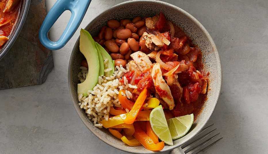 Easy chicken tinga rice bowls A close-up view of an easy chicken tinga rice bowl