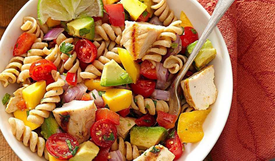 Cilantro-lime pasta salad A close-up view of cilantro-lime pasta salad in a bowl