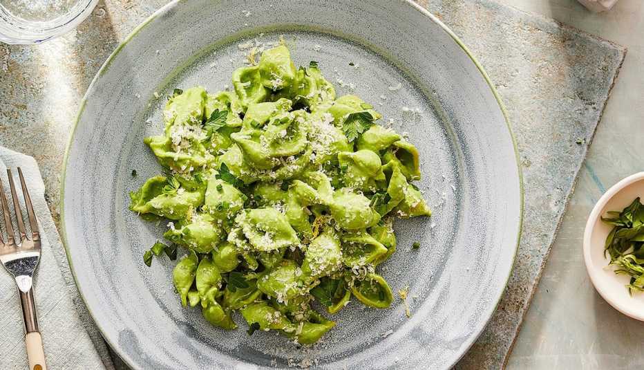 Green goddess ricotta pasta A close-up view of green goddess ricotta pasta on a plate