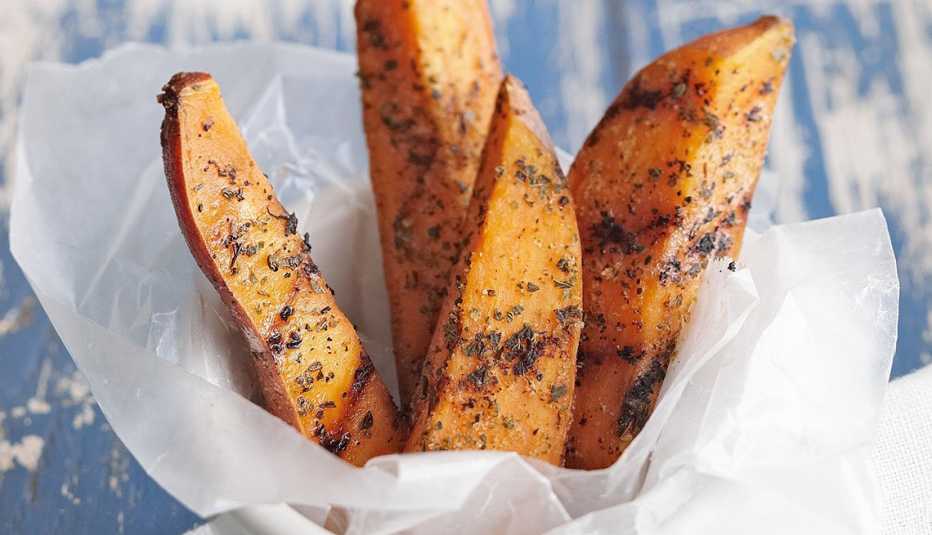 Grilled sweet potato wedges A close-up view of grilled sweet potato wedges