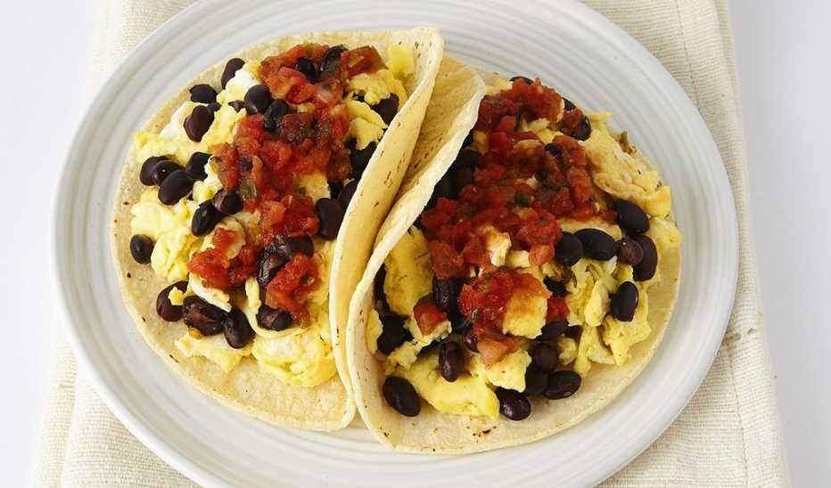 A close-up view of high-protein breakfast tacos on a plate