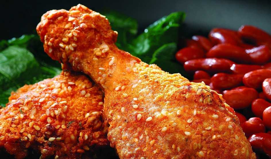 A close-up view of an oven-fried chicken