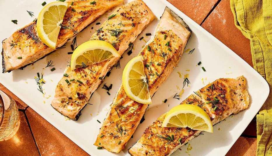 A close-up view of lemony-garlic pan-seared salmon on a plate