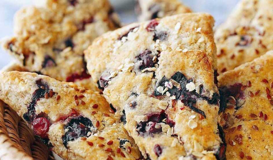 Blueberry-oat scones with flaxseeds A close-up view of blueberry-oat scones with flaxseeds