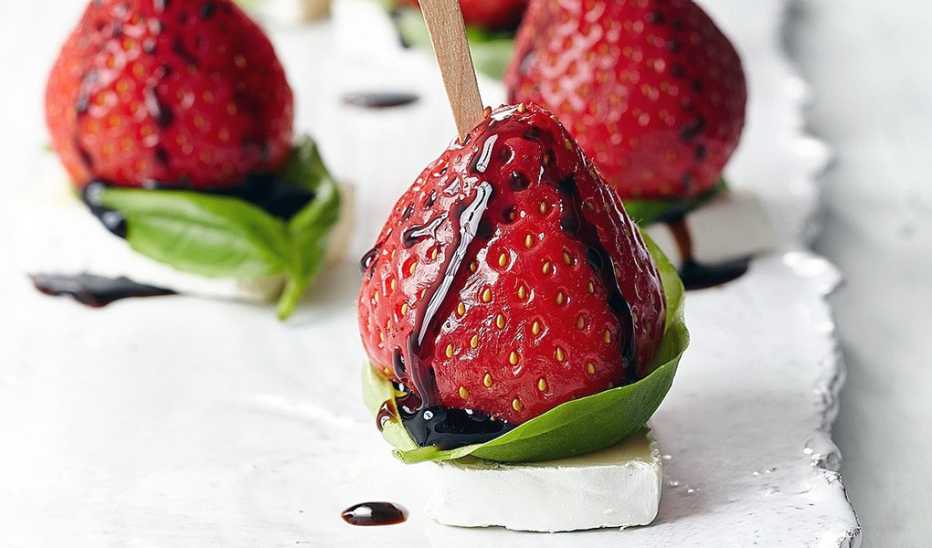 A close-up view of strawberry and brie bites