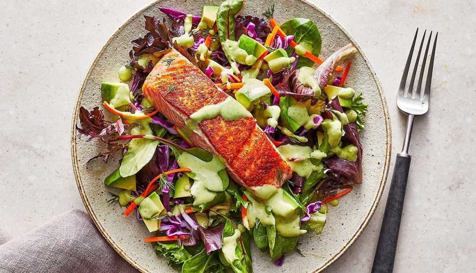 Salmon and avocado salad A close-up view of salmon and avocado salad on a plate