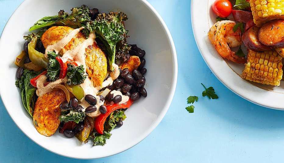 Sheet-pan chicken fajita bowls A close-up view of sheet-pan chicken fajita bowls